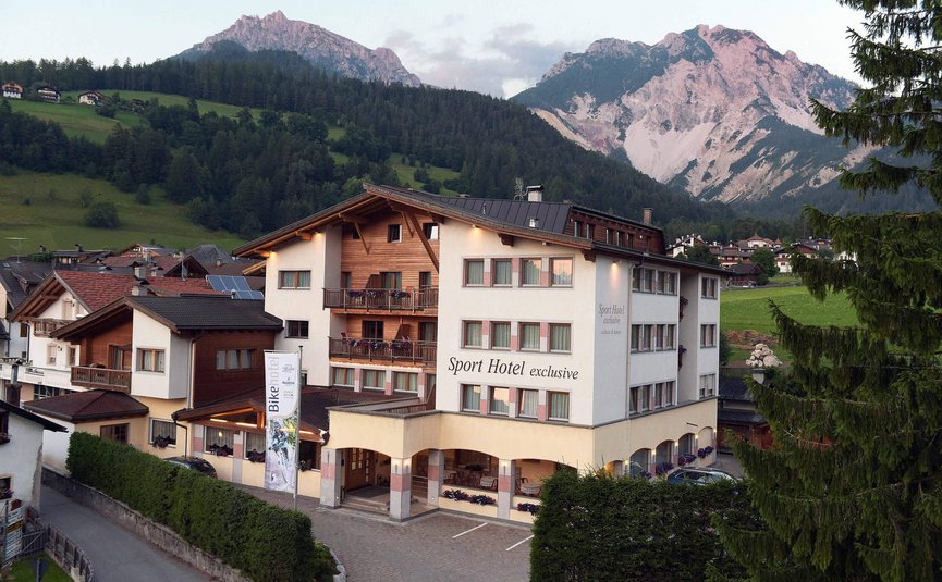 Sport hotel in the Alps with mountains in the background